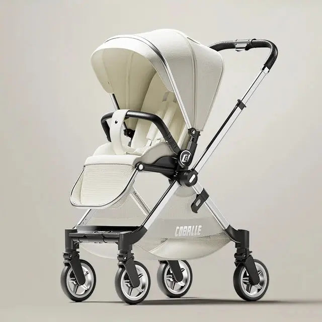 a white stroller with a black handlebar