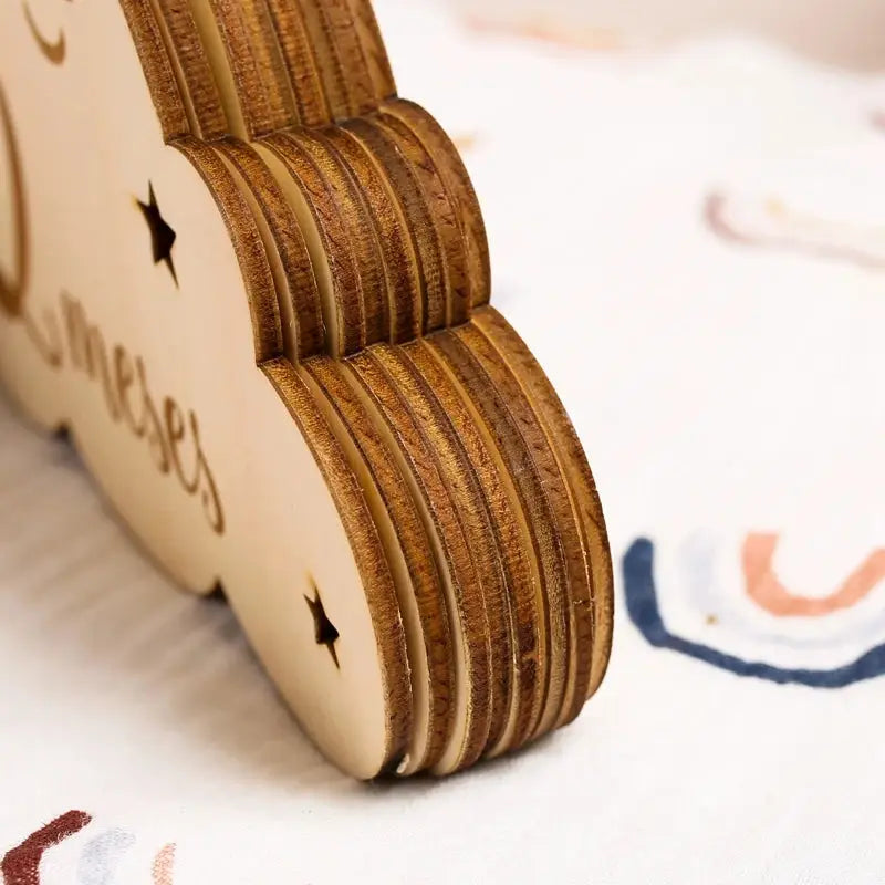 a stack of wooden coasters sitting on top of a table