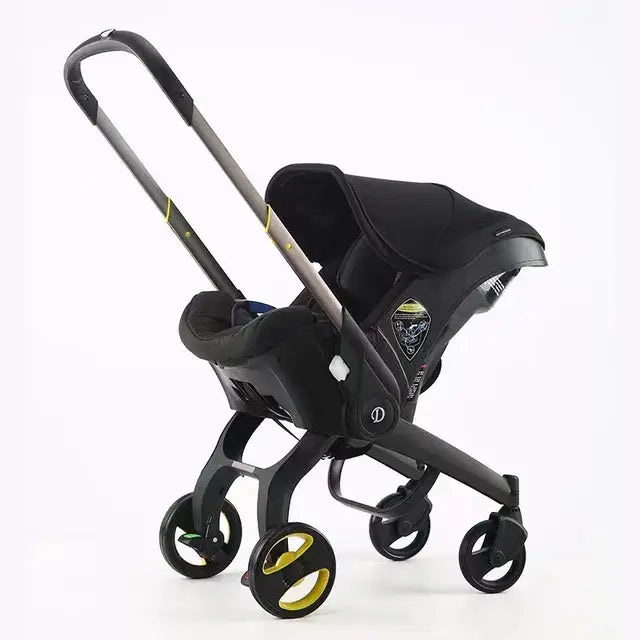 a baby stroller with a handlebar attached to it