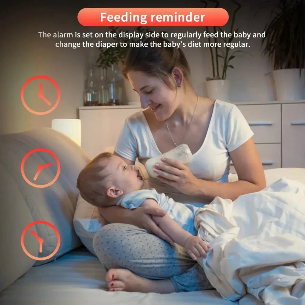 a woman is feeding a baby with a bottle