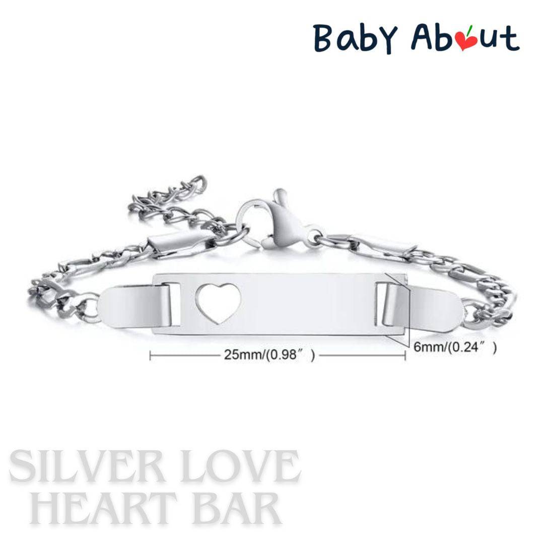 a silver bracelet with a heart on it