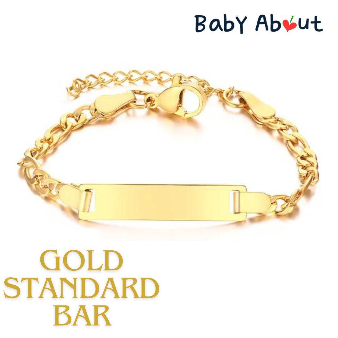 a gold bracelet with a bar on it