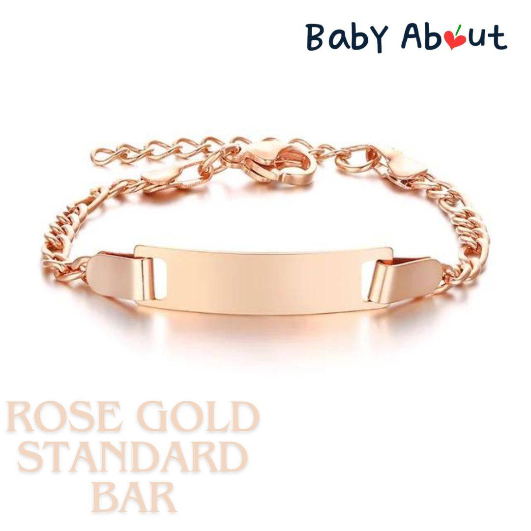 a rose gold bracelet with a bar on it