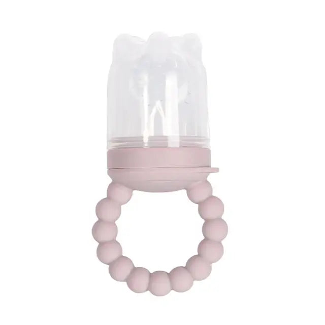 a pink pacifier with a white ring on it