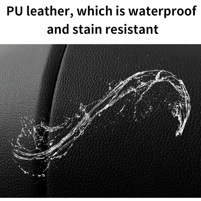 a black and white photo of a leather seat