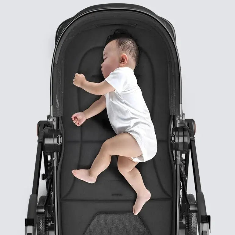 a baby is sitting in a stroller