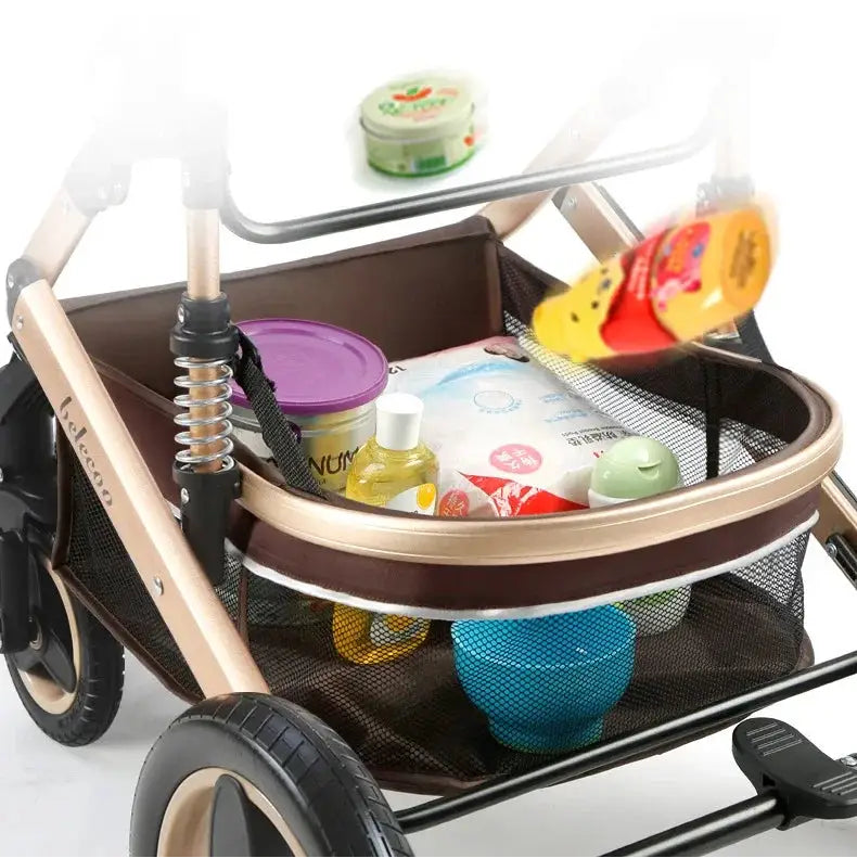 a baby stroller with various items in it