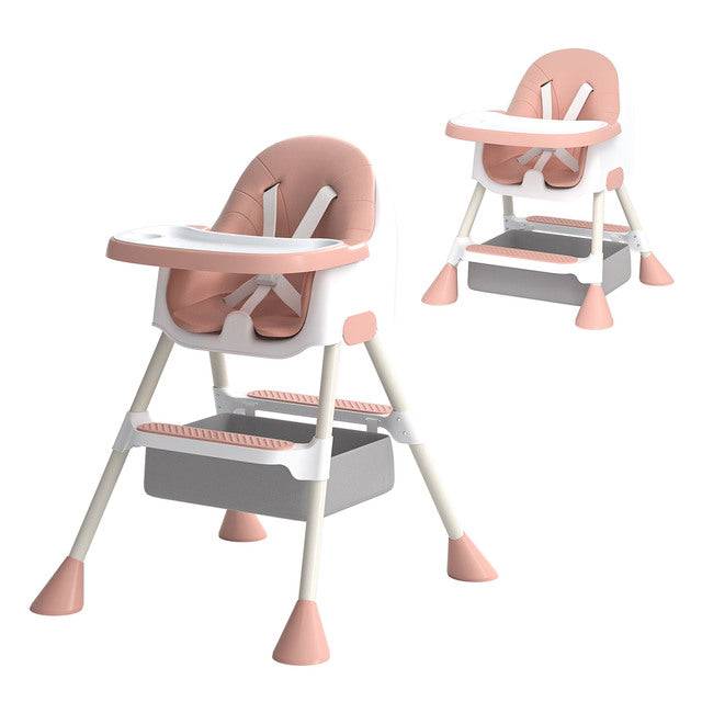 a pink and white high chair with a tray